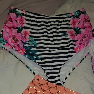 To rid black stripe floral swim bottoms